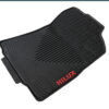 OEM rubber floor mats with the Hilux logo in red for Toyota Hilux