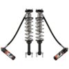 A presentation photo of the product "Front Adjustable Shock FOX Performance Elite Series 2.5". The photo showcases the pair of shocks with silver bodies, external reservoirs, and springs.