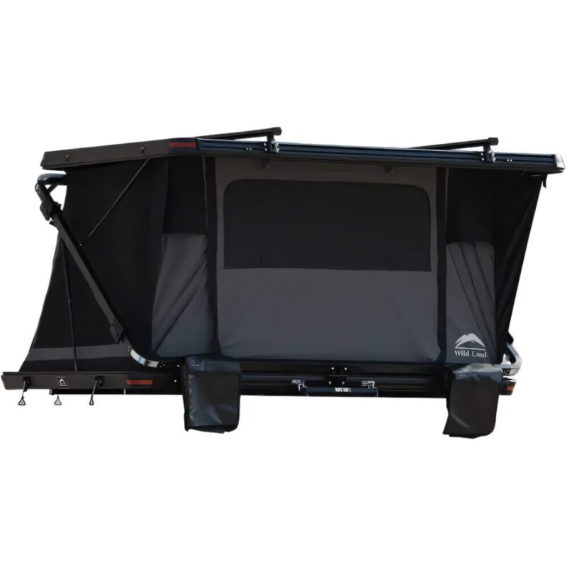The Rock Cruiser rooftop tent for the car, with closed door. Externally, it has 2 shoe storage pockets and is in a "Z" letter shape. It closes well enough to keep sunlight out of the tent while camping.