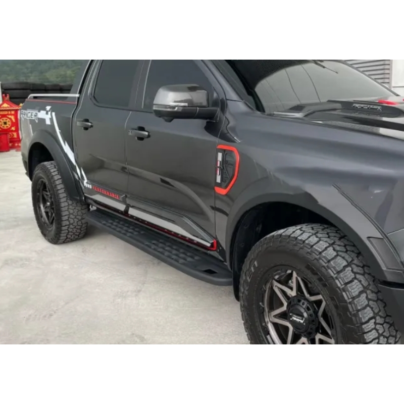 Left side view image of the Ford Ranger with the Ford Ranger T6-T7-T8 2012-22 Steel Side Steps - Raptor Gen 2 installed.