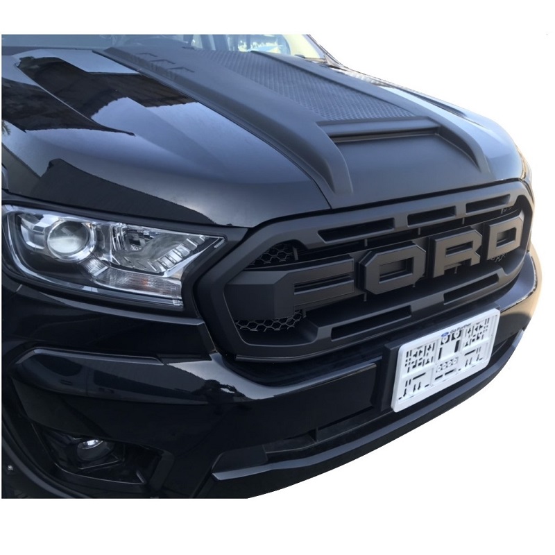 A side closeup view image showing the Ford Ranger XLT T8 2019-22 Front Grille - Raptor Type installed on a Ford Ranger