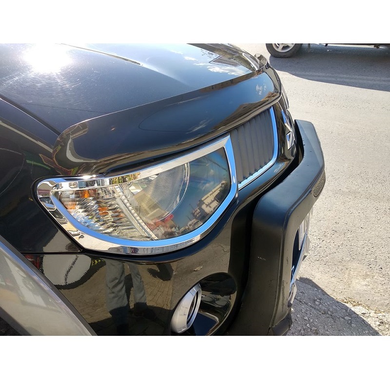 Image showing the Mitsubishi L200 Triton 2005-11 Headlight Covers installed