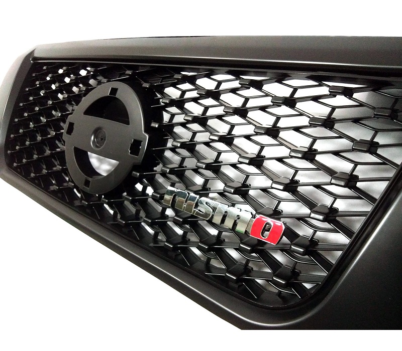 Close side product image showing the Nissan Navara NP300 2015+ Front Grille - Type Nismo