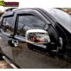Front close-up image of the Nissan Navara D40 with the Nissan Navara D40 2005-2011 Mirror Covers installed.