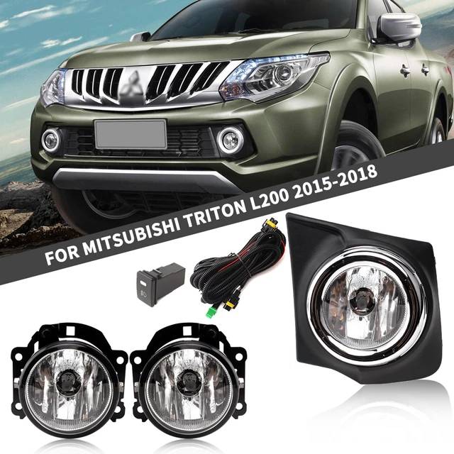 Image showing a Mitsubishi Triton L200 (2015-2018) with a set of car accessories against a white background. The accessories include two round fog lights, wiring, and a switch, clearly intended for the vehicle model shown above them.