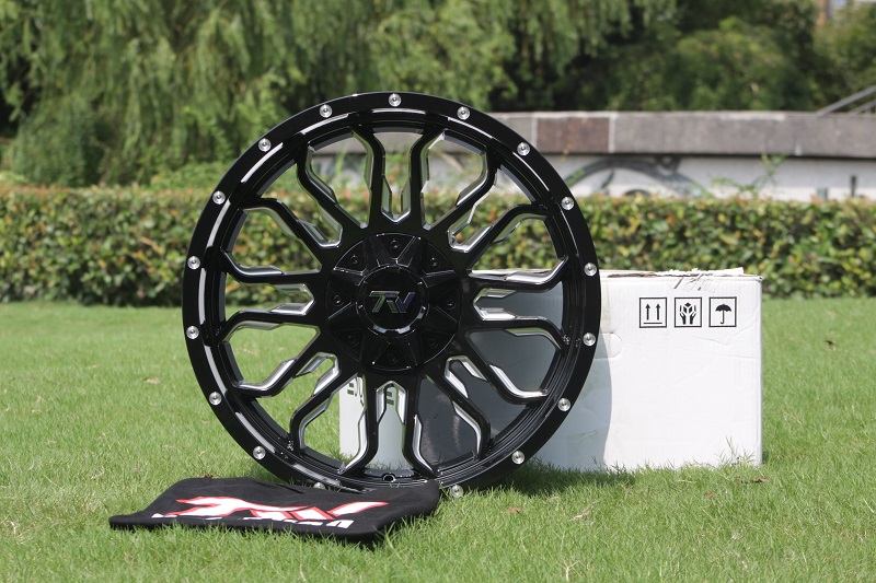 Front view of TW Wheels T8 Flame Silver displayed on grass