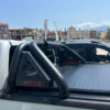 This image shows the roll bar Two Pipe installed in combination with a tonneau cover