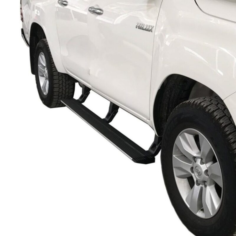 Image showing the Toyota Hilux Revo-Rocco 2015-2020 Electric Side Steps - Phantom installed on a Toyota Hilux Revo-Rocco.