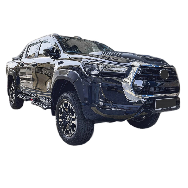 Front view of the Toyota Hilux with the Toyota Hilux 2020+ Steel Side Steps - Ronin installed.