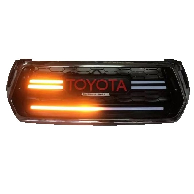 Product image showing the illuminating Toyota Hilux Rocco 2018-20 Front LED Grille Toyota Logo