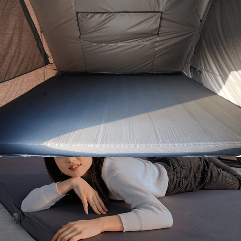 Image showing the Double Self-Inflating Foam Camping Air Mattress - WildLand on a car roof tent. Below is an image of a girl lying on her belly.