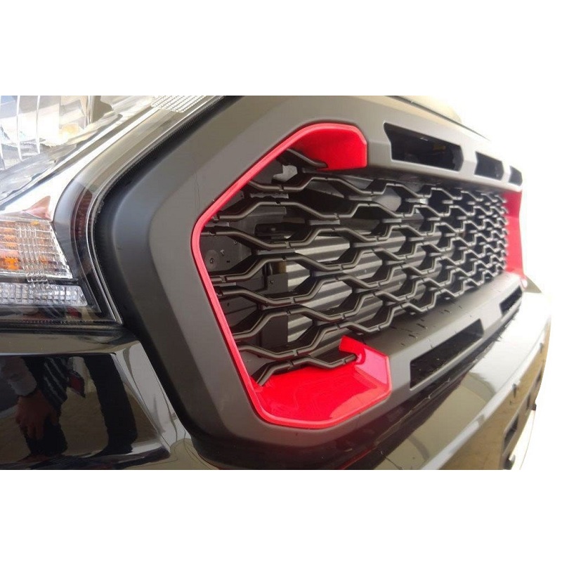 A side closeup view image showing the Ford Ranger T8 2019-22 Front Grille - Redo installed on a Ford Ranger