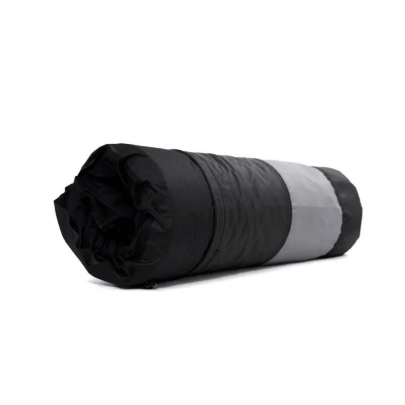 Image showing the Self-Inflating Foam Air Pillow - WildLand product lying inside its black-silver fabric case.