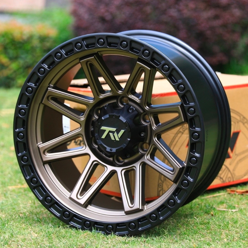 A front view of the Aluminum Wheels 17″ 6×139.7 - TW Wheels T23 Vector Bronze