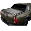Rear view image of the Toyota Hilux 2020+ ABS Sport Roll Bar Invincible combined with roller lid