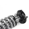 Close preview of the preload ring and adjustable racing spring on the Revo shocks.