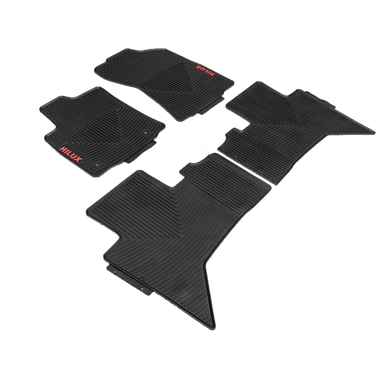 Side view of the OEM rubber floor mats with the Hilux logo in gray for Toyota Hilux