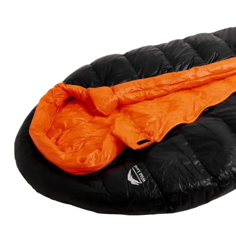 Product Photo: The image focuses on the bright orange round neck collar that folds up to become a pillow.