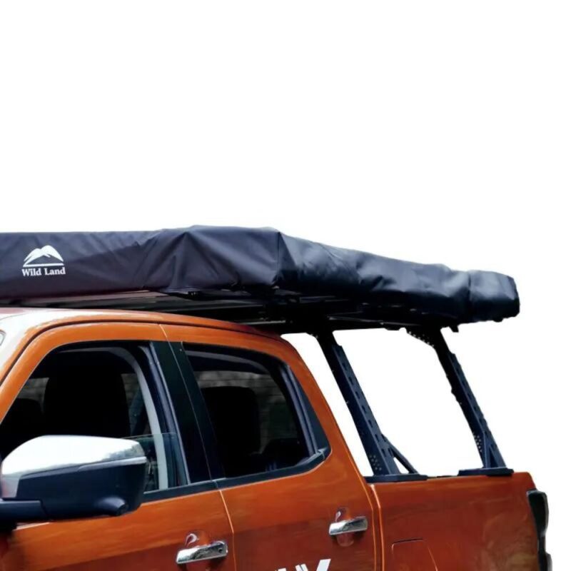 Image showing the product Adjustable roll cage/bed rack - WildLand installed. It has a closed roof tent above.