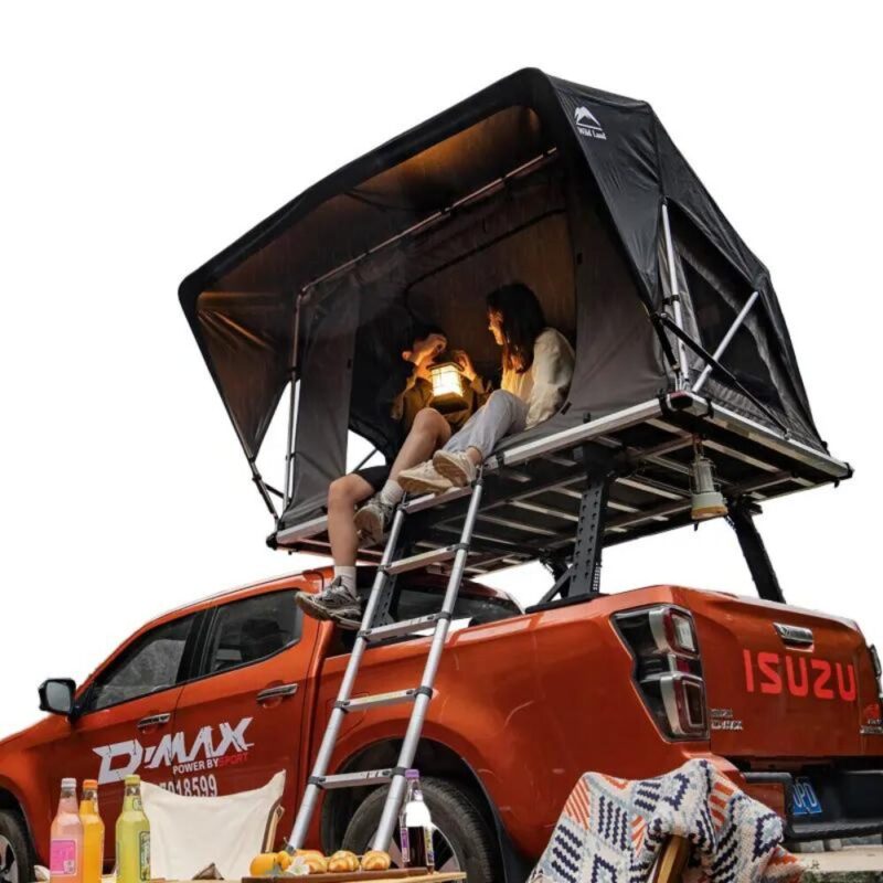 Image showing the product Adjustable roll cage/bed rack - WildLand with car roof tent installed. 2 people sit comfortably inside and it can withstand the weight.