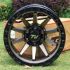 Front view of TW Wheels T21 Bronze displayed on grass