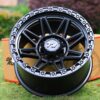Top view of TW Wheels T23 Vector Full Black displayed on grass