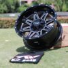 Top view of TW Wheels T1 Spear Silver displayed on grass