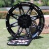 Front view of TW Wheels T1 Spear Silver displayed on grass