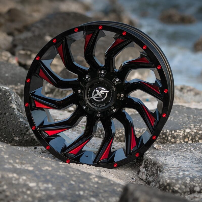 Image displaying the front view of the Aluminum Wheels 17″/20″ 5×127/6×139.7 - XF Off-Road 224 on rocks