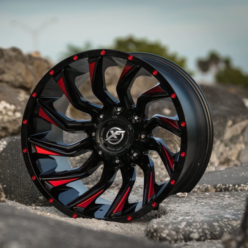 Image displaying the side view of the Aluminum Wheels 17″/20″ 5×127/6×139.7 - XF Off-Road 224 on rocks