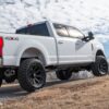 Image displaying the rear view of a pickup truck equipped with the Aluminum Wheels 17″ 6×139.7 - Fuel Off Road Siege