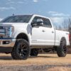 Image displaying the front view of a pickup truck equipped with the Aluminum Wheels 17″ 6×139.7 - Fuel Off Road Siege